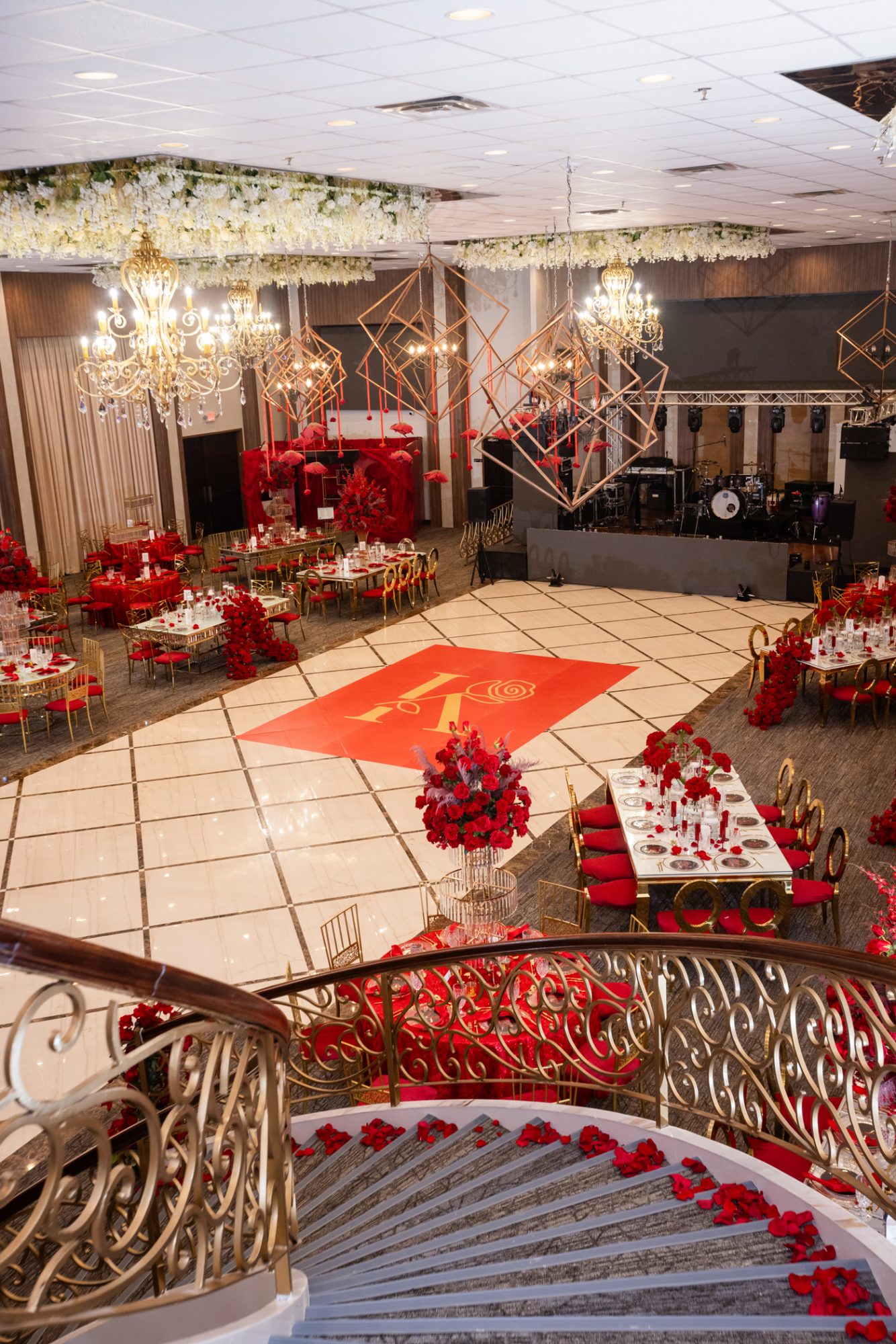 Quinceañera grand entrance down double staircase at San Antonio venue