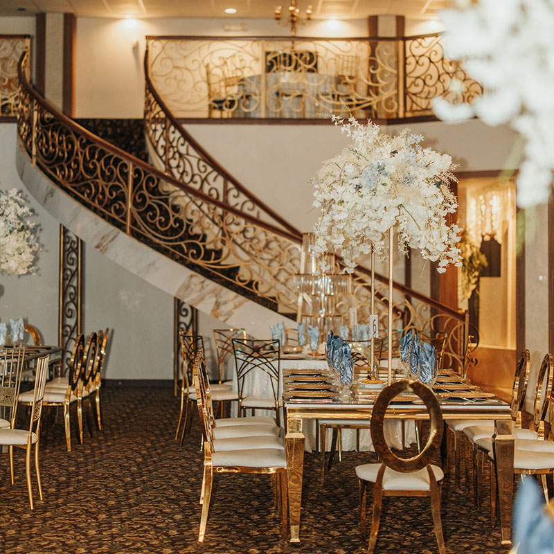 Renaissance Room grand ballroom with double spiral staircase at Emporium by Yarlen San Antonio